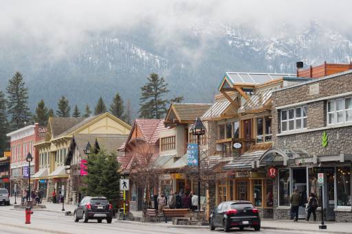 People stroll through the town of Banff inside Banff National Park in Alberta, Canada, April 21, 2017.